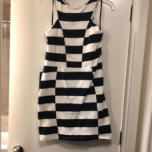 Cross back checkered Bebe dress